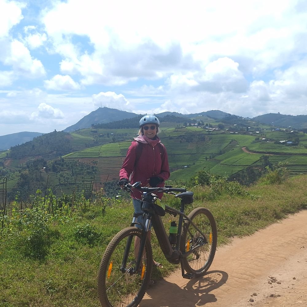 Premium e-bike cycling through the hills of Karongi near Lake Kivu Rwanda